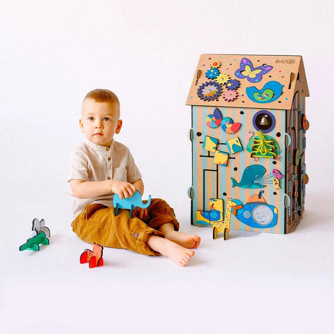 busy zoo activity cube with child exploring