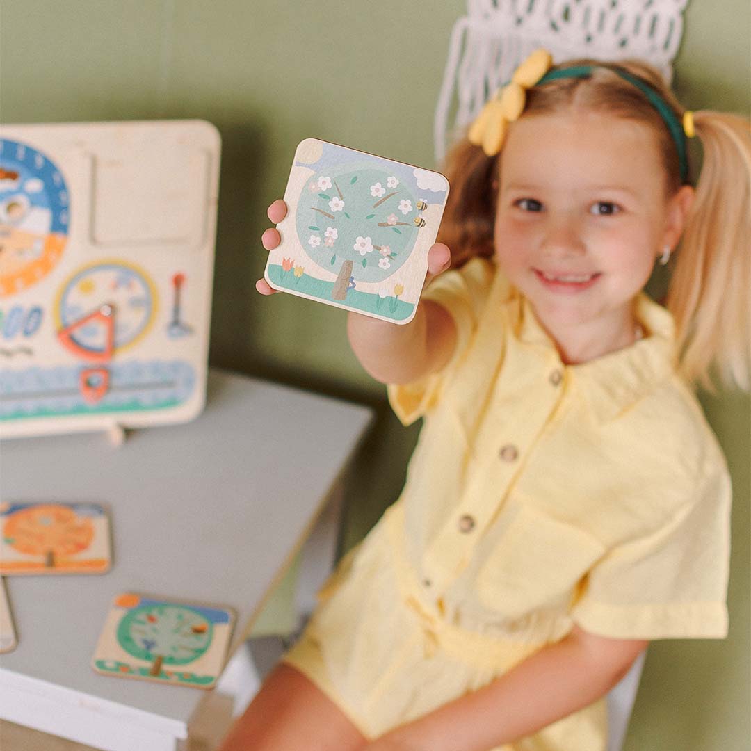 interactive calendar toy with weather dial