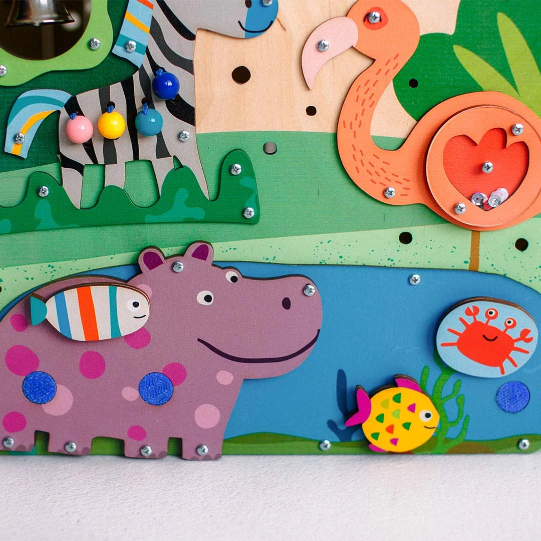 Velcro fish matching game on Montessori busy board