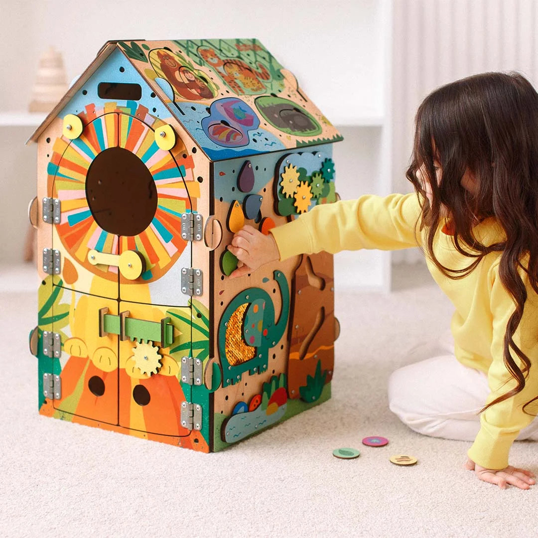 Sensory exploration on Montessori jungle busy board
