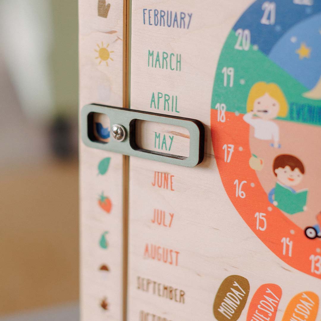 wooden board with months and icons