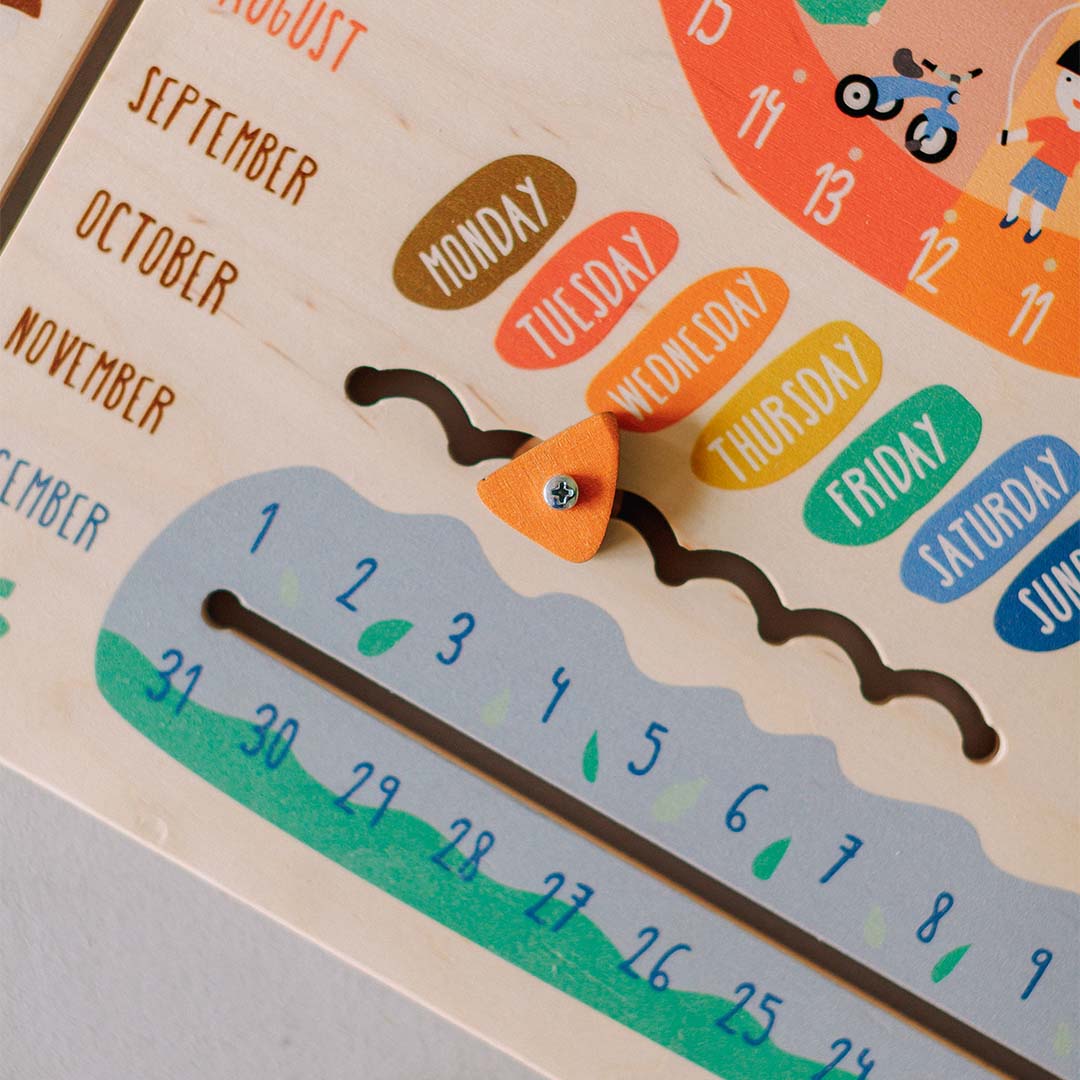 calendar puzzle with movable date markers