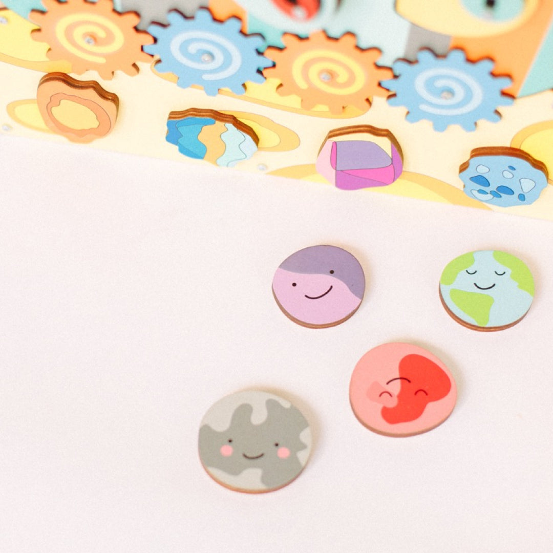 toddler exploring solar system puzzle